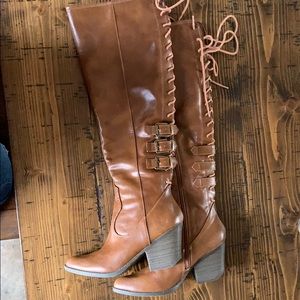 Tall lace up boots